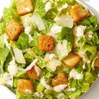Side Piece Caesar Salad · Romaine lettuce with croutons, parmesan cheese, and caesar dressing.