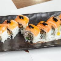 Ozora Roll · Spicy tuna, fried shishitos topped with torched escolar, house ponzu, shredded pepper