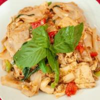 Pad Kee Mao (Drunken Noodles) · Wide noodle stir fried with egg, onion, bell pepper, chili and basil leaves.