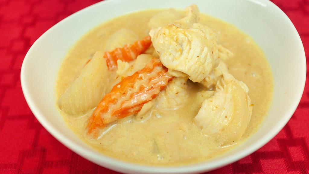 Yellow Curry · Yellow curry paste, coconut milk, potato, carrot and onion with rice.