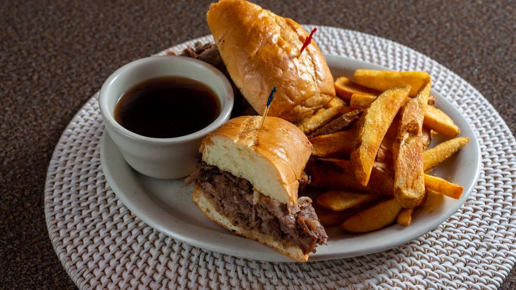 Prime Rib Dip · Eight ounce of our slow roasted prime rib sliced deli style on a French roll.