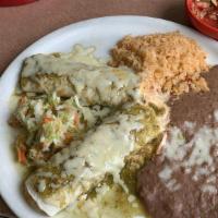 Enchiladas Verdes With Pollo Asado · Corn tortillas filled with charbroiled chicken, topped with roasted tomatillo salsa with let...
