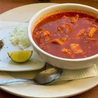Menudo · Spicy soup made of cow tripe in broth with a red chili base.