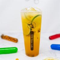Passion Fruit Green Tea · passion fruit syrup, lime slices, jasmine green tea