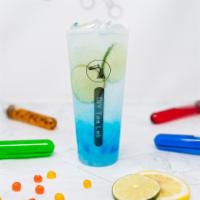 Blue Ocean · blue curacao syrup, lime slices, sparkling water