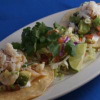 Ceviche Tostada Salad · Chile-lime marinated shrimp, crab & calamari, avocado, tomato, cilantro & crisp white corn t...