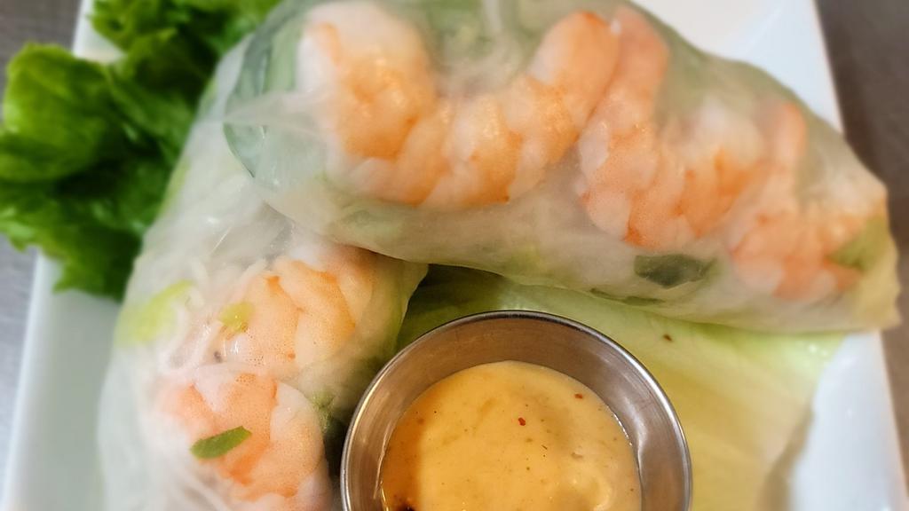 2 Pieces Spring Rolls · A rice paper wrap filled with shrimp, lettuce, bean sprout and rice noodle. Served with thai peanut sauce. Gluten free.