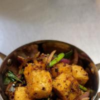 Salt & Pepper Tofu · Cubes of tofu fried till golden brown tossed with seasoning, bell peppers and onions. Hot an...