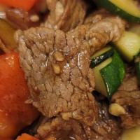Thai Curry Lime Beef · Stir fry beef with bell peppers and onions in curry and fresh lime juice. Hot and spicy.