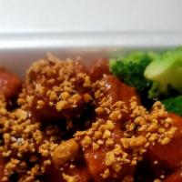 Tofu Param · Crispy tofu tossed with combination peanut sauce and curry, served with steam broccoli. Hot ...