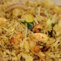 Tropical Fried Rice · Curry flavored rice with shrimp, pineapple, egg, cashew and veggies. Hot and spicy. cant be ...