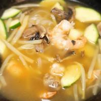 Tom Yum Noodle Soup · The authentic thai tom yum goong soup with all thai spices and served with rice noodles. Glu...