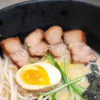 Tonkatso Ramen · Pork broth. Soft boiled egg, narutomaki, bamboo shoot, wood ear mushroom, beansprout and cha...