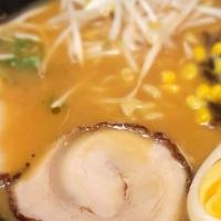 Miso Ramen · Soy bean. Soft boiled egg, wood ear mushroom, sweet corns, beansprout and charsiu.