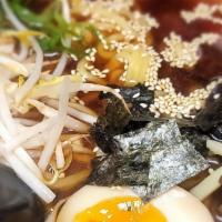 Shoyu Ramen · Soy sauce. Soft boiled egg, wood ear mushroom, bamboo shoot, beansprout and charsiu.