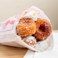 Dozen Donuts · A Bag of a Dozen Silver Dollar Size Mini Cake Lil' Orbits Donuts, with sugar if you desire