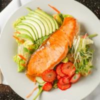Strawberry Salmon Salad · Avocado, romaine hearts, spring mix, tomatoes, cucumbers, carrots and mandarin oranges toppe...