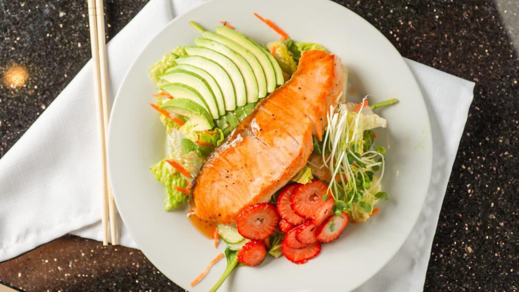 Strawberry Salmon Salad · Avocado, romaine hearts, spring mix, tomatoes, cucumbers, carrots and mandarin oranges topped with grilled salmon and house dressing.