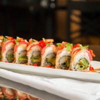 Shogun · Yellow tail, tempura green onion, avocado, topped with crab salad, tuna, bell pepper, cilant...