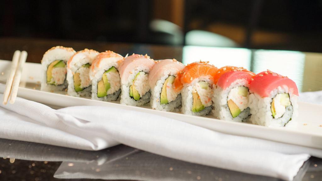 Rainbow · California topped with five different fish and sesame seeds.