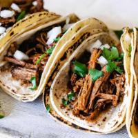 Barbacoa Taco Order · Four tacos at the meat of your choice, with red or green chili sauce.