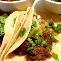 Deshebrada Tacos Order · Four tacos at the meat of your choice, with red or green chili sauce.