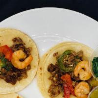 Mar Y Tierra Taco Order · Four tacos at the meat of your choice, with red or green chili sauce.