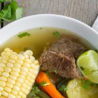 Caldo De Res Bowl · Beef soup with veggies served with rice, corn or flour tortillas and red or green chili sauce.