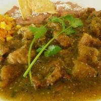 Chicharron Plate · All plates served with salad, rice, beans, corn or flour tortillas and red or green chili sa...