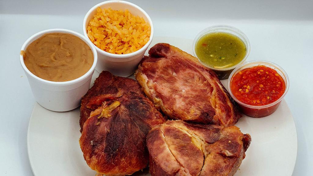 Pork Carnitas Plate · All plates served with salad, rice, beans, corn or flour tortillas and red or green chili sauce.
