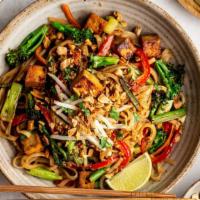 Pad Thai (Veg) · Stir-fired rice noodles with tamarind sauce, tofu, chive and bean sprout. Served with choppe...