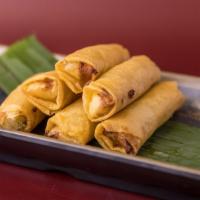 Egg Rolls · 5 Pieces of Deep-fried mixed vegetables wrapped with egg roll skin served with ThaiDash’s Sw...