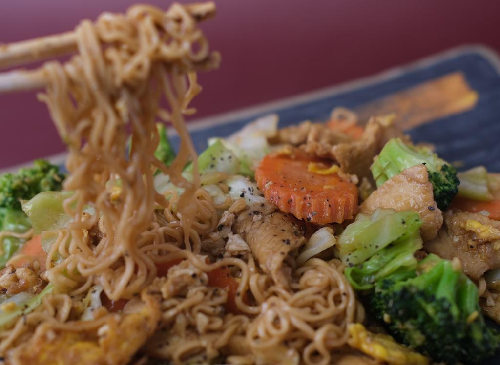Thai Street Noodle · Stir-fried instant Ramen Noodle with carrot, cabbage, broccoli, chicken, shrimps, and egg. (Pad Mama)