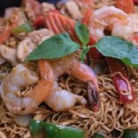Thai Street Noodle Kee Mao · Stir-fried instant ramen noodle with carrot, onion, bell peppers, tomatoes, basil, chicken, ...