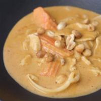 Massamun Curry · Massamun curry paste, coconut milk, carrot, potato, onion, topped with roasted peanut. Serve...