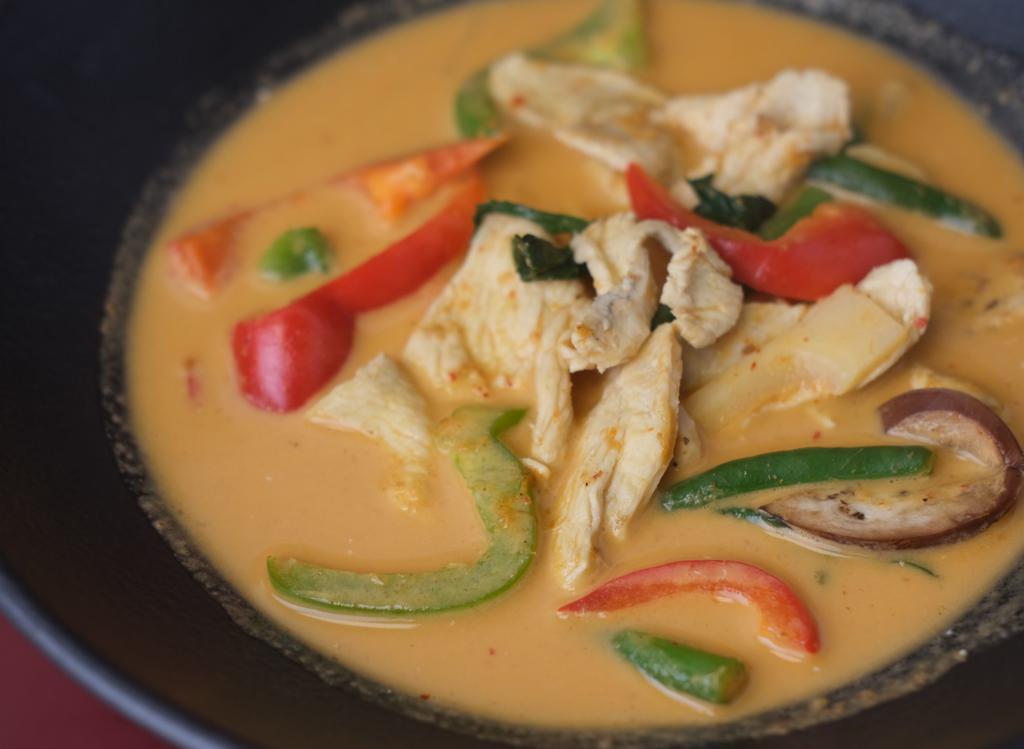Red Curry · Red curry paste, coconut milk, bamboo shoot, carrot, bell pepper, basil, and Chinese eggplant. Served with Jasmine Rice. (32 oz)