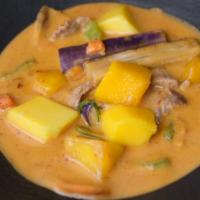 Mango Curry  · Red curry with mango, bell pepper, carrot, onion, and basil.