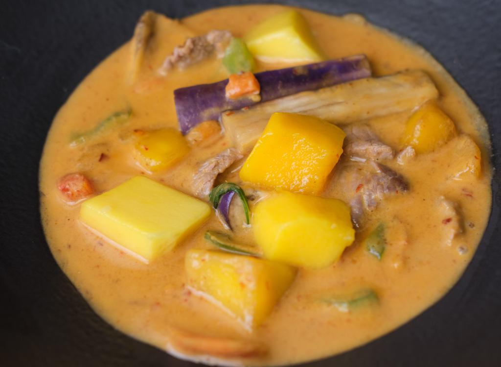 Mango Curry  · Red curry with mango, bell pepper, carrot, onion, and basil.