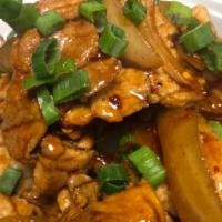 Spicy Pork Bowl · Pork and onions stir-fried with ThaiDash's spicy sauce on top of Jasmine rice. The Sauce con...