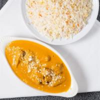 Chicken Korma · Marinated and cooked with yogurt, nuts,delicate herbs and spices.