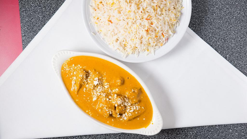 Chicken Korma · Marinated and cooked with yogurt, nuts,delicate herbs and spices.
