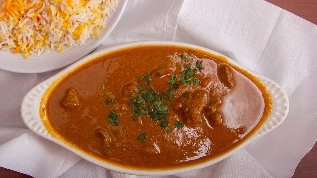 Lamb Curry · Boneless lamb with onion base curry and house spices.
