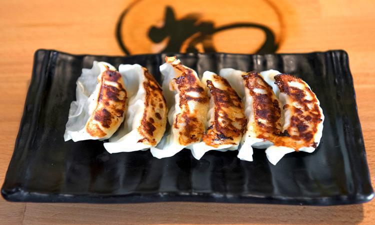 A3 Gyoza · Pan-fried pork and chicken pot stickers. 6 pieces.