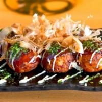 A4 Takoyaki · Octopus ball with seaweed, mayo, okonomi sauce, and bonito flakes. 6 pieces.