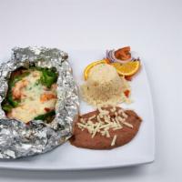 Filete Empapelado · steamed fish filet with shrimp and vegetables