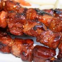 Grilled Pork Liempo Grilled Ala Carte · Grilled juicy pork belly marinated in sweet and savory sauce.