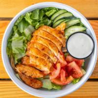 Buffalo Chicken Salad · Lettuce mix, cucumbers, and tomatoes topped with chicken tossed in original buffalo sauce.