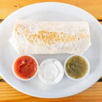 Big Sky Burrito · Choice of bacon, ham, sausage or veggie, egg, hash browns, and cheese served with a side of ...