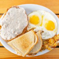 Country Fried Steak · Country fried steak smothered with sausage country gravy. Served with two eggs, hash browns ...