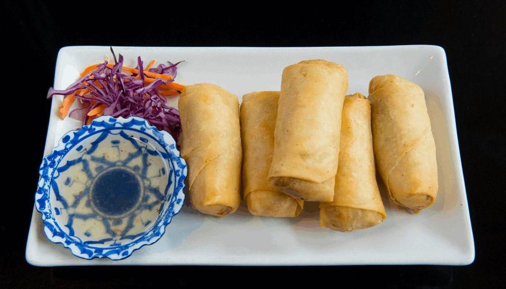 Spring Rolls · Mixed vegetable and glass noodle wrapped in spring rolls wrapper and deep fried. Served with plum sauce.